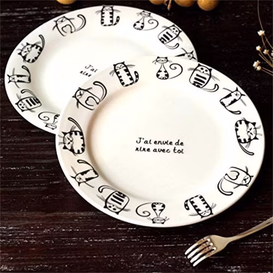 Piatto smaltato per dessert con piastra in metallo smaltato nero